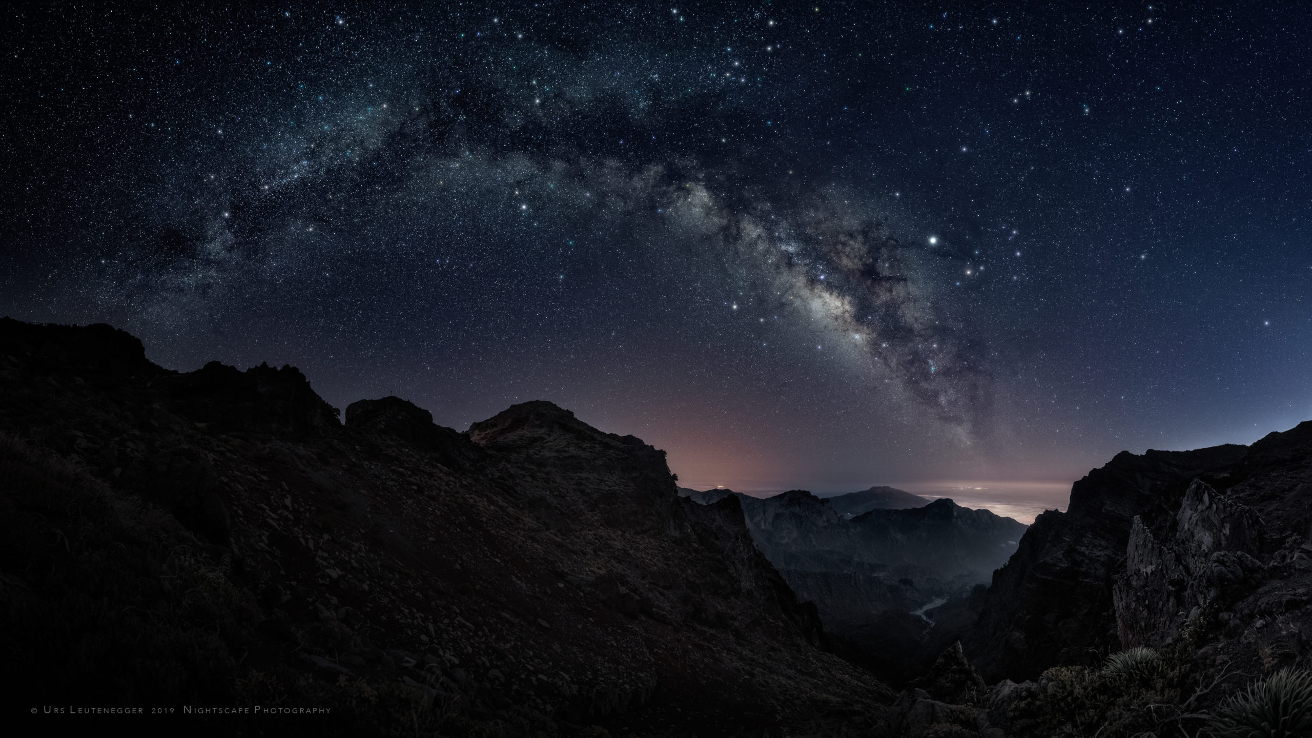 Summer Milky Way over Caldera de Taburiente, La Palma. Scorpio and Sagittarius in the south with Jupiter and Saturn, constellation Eagle and Swan towards north.