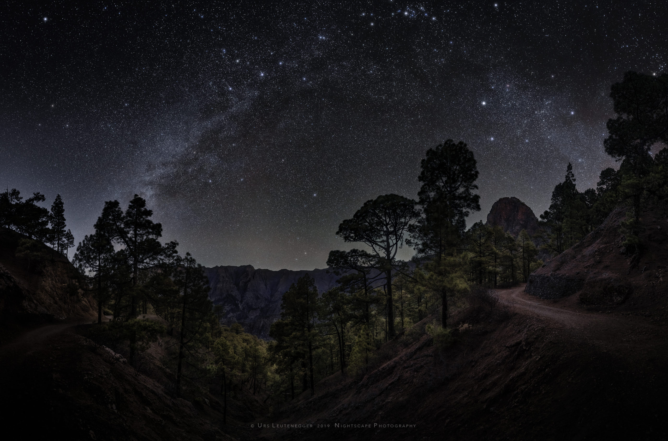 Polaris and the Milky Way after moonset. Wild-romantic landscape of Cumbrecita and Caldera de Taburiente on La Palma.